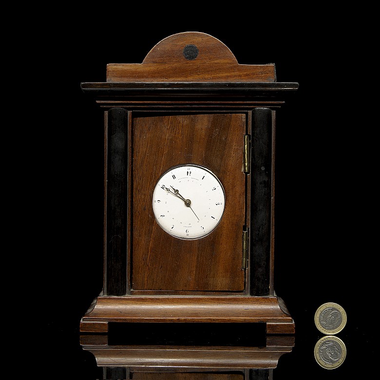 ‘Eardley Norton’ pocket watch with wooden stand, 19th century