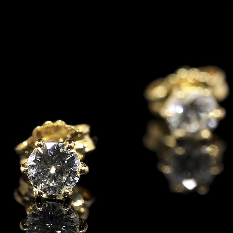 Pendientes de oro amarillo 18 k y brillantes 0,60 ct.