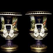 Pair of porcelain enamelled urns ‘Lovers’, 20th century