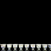 Complete set of twelve cups with flowers, 20th century