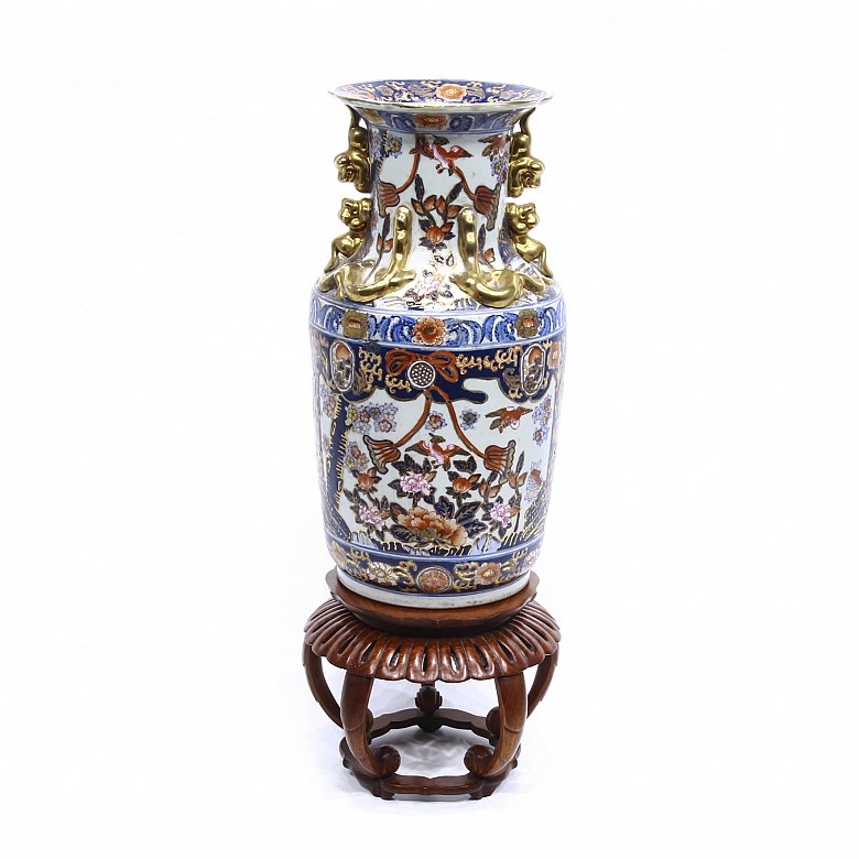 Enameled porcelain vase with golden details, 20th century