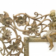 Vicente Andreu. Two fretworked wooden frames with cherubs, 20th century.