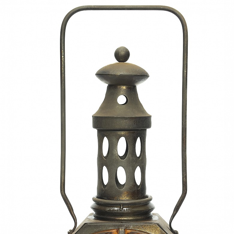 Metal and glass lantern.