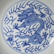 Blue and white porcelain ‘Dragons’ dish, with Guangxu seal