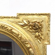 Pair of carved and gilded wood mirrors, 20th century