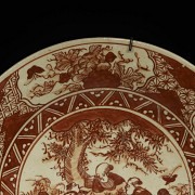 Iron-red enamelled porcelain plate ‘Garden Scene’, with Yongle mark