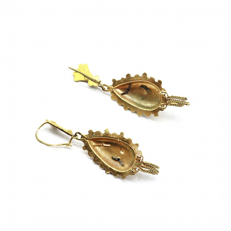 14k yellow gold earrings.