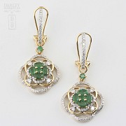 Earrings in 18k yellow gold, emeralds and diamonds.