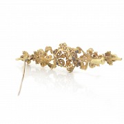 18k yellow gold and zirconia brooch