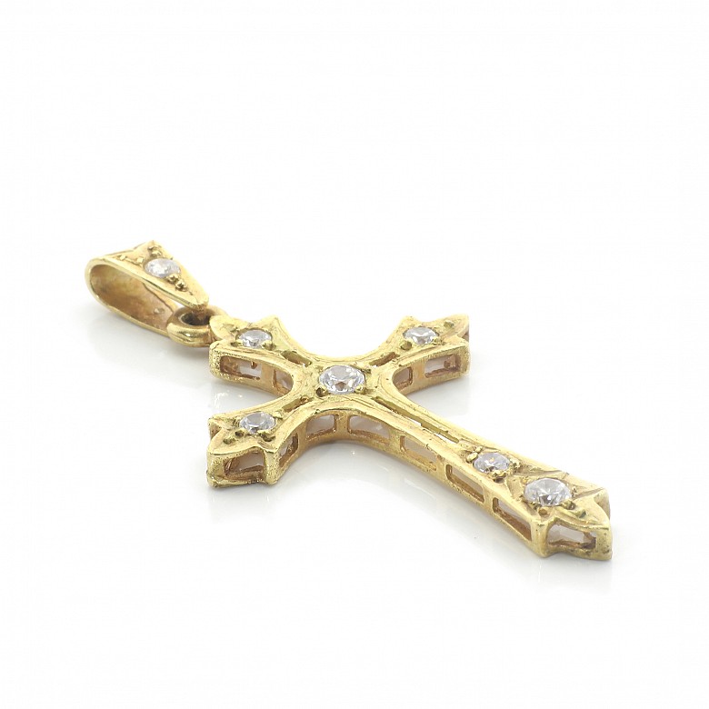 Openwork cross in 18k yellow gold and zircons