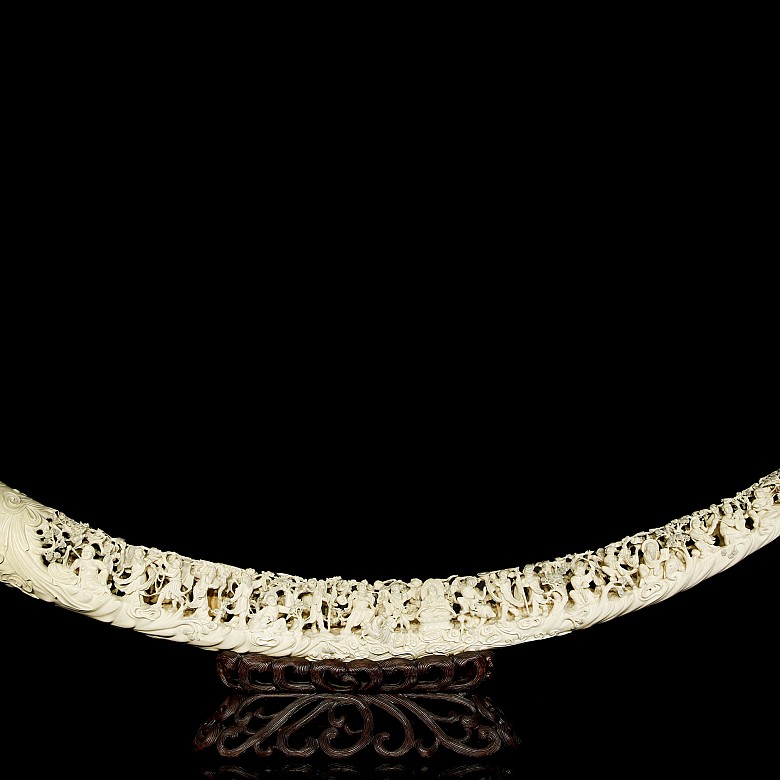 Carved ivory tusk ‘Immortals’ on wooden base, 19th century