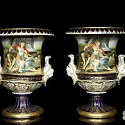 Pair of porcelain enamelled urns ‘Lovers’, 20th century