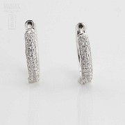 Earrings in 18k white gold and diamonds.