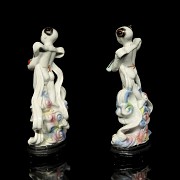 Pair of porcelain children, 20th century