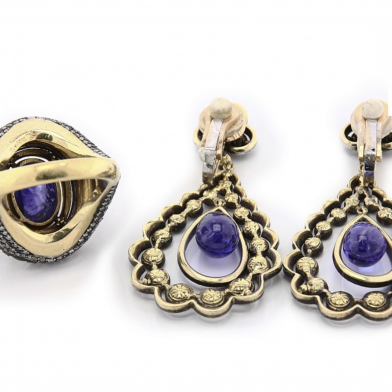 Ring and earring set in 18k gold with tanzanite and diamonds.