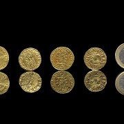 Group of four gold coins