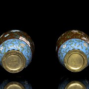 Pair of small enamelled bronze vases, 20th century