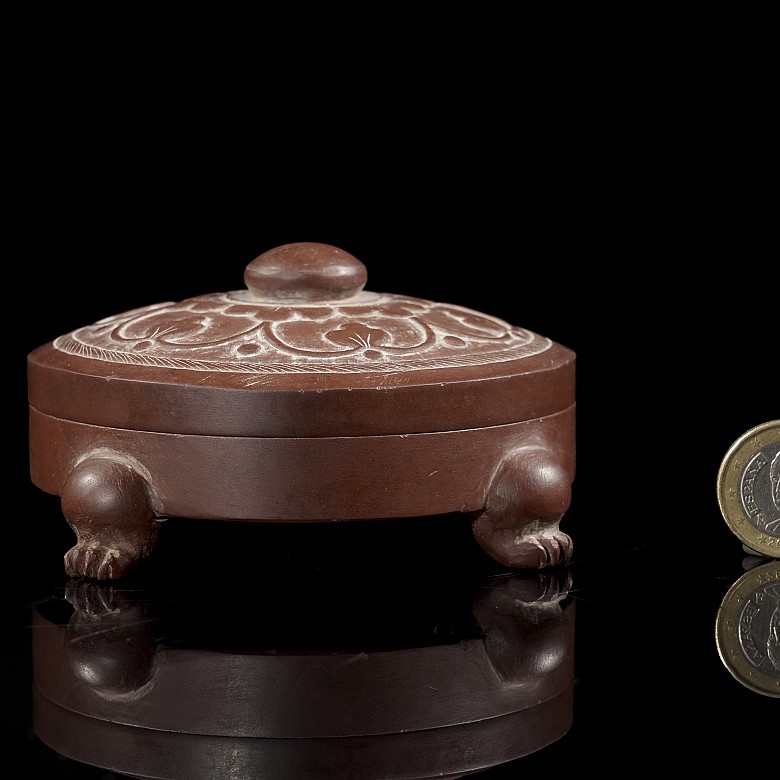 Carved red stone inkwell, 20th century