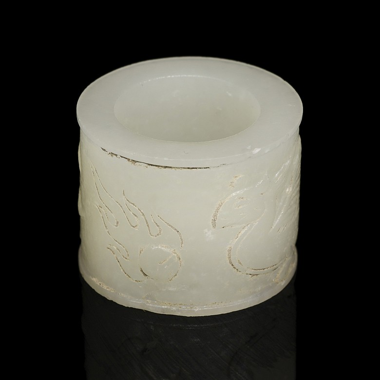 White jade “Phoenix and flaming pearl” archer ring, Qing dynasty