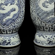 Pair of large vases with dragons, 20th century