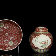 Three plates and a small jar of Asian porcelain “ famille rose”, 20th century