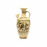 A glazed chinese ewer Cizhou style ware.