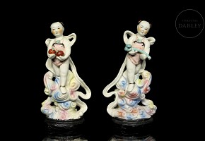 Pair of porcelain children, 20th century