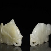 Two white jade fish plaques, 20th century