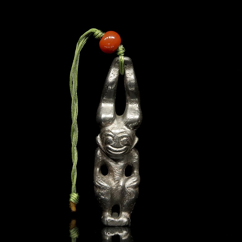 Carved stone pendant, 20th century