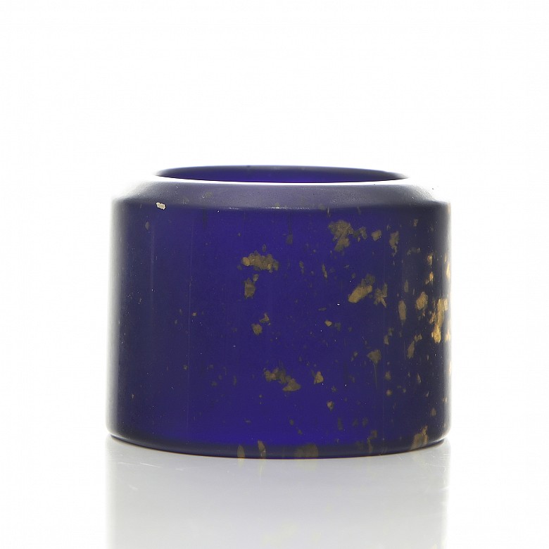 Archer's ring of blue glass and gold leaf shavings, 20th century