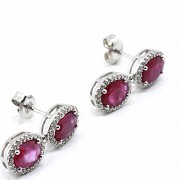 Earrings in 18k white gold with rubies and diamonds.