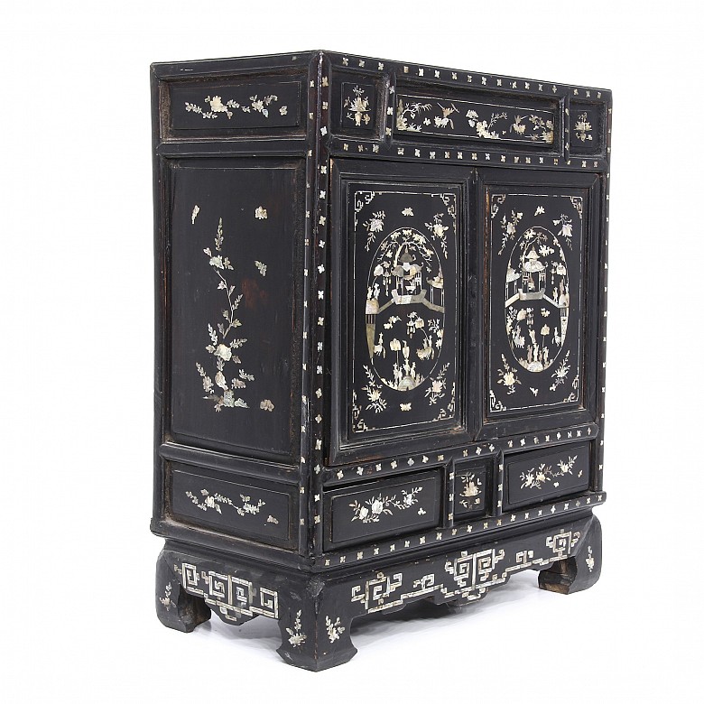 A Chinese lacquered cabinet with mother-of-pearl inlays, Qing dynasty.