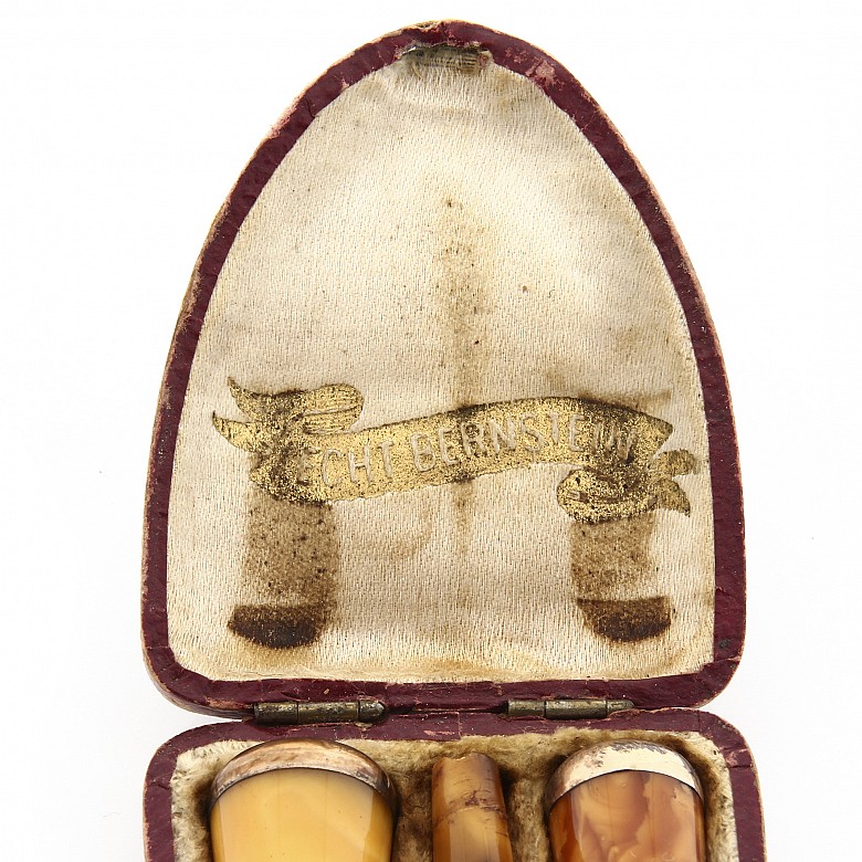 Two pipes and a mouthpiece of amber and gold, 19th century