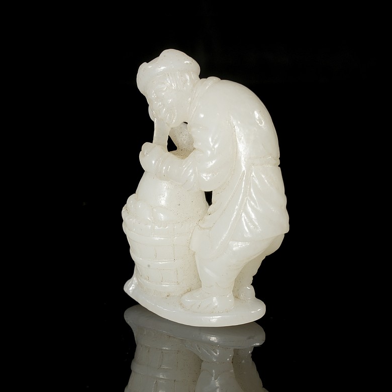 Carved jade figurine ‘Man with barrel’, Qing dynasty