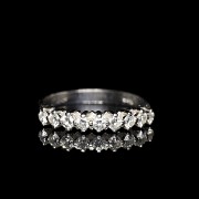 Half wedding ring with diamonds in white gold