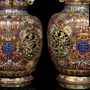 Pair of giratiorian vases, 19th - 20th century