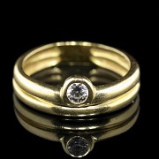 Doble anillo de oro amarillo 18 k con brillante