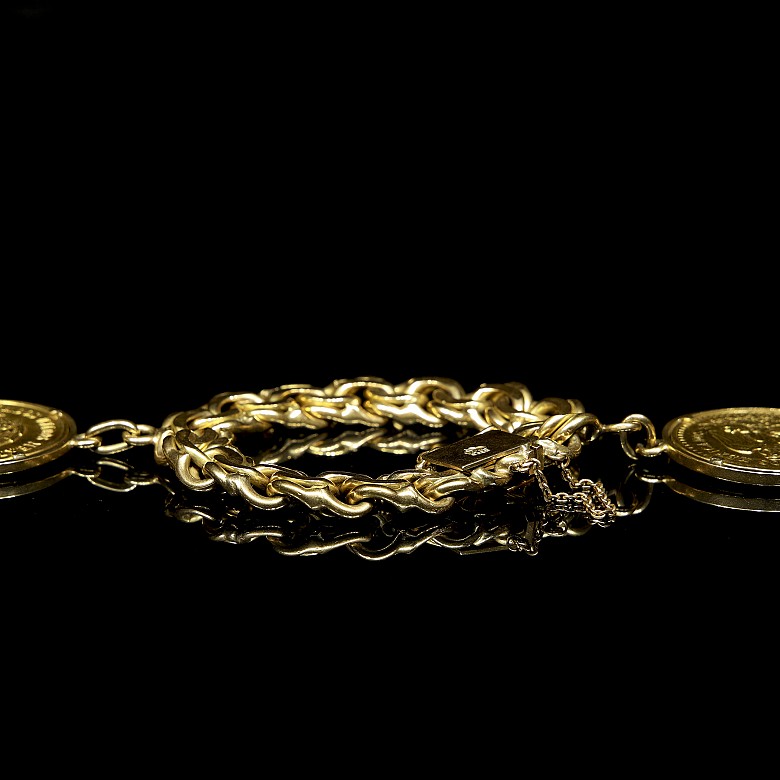 Pulsera con dos monedas de oro