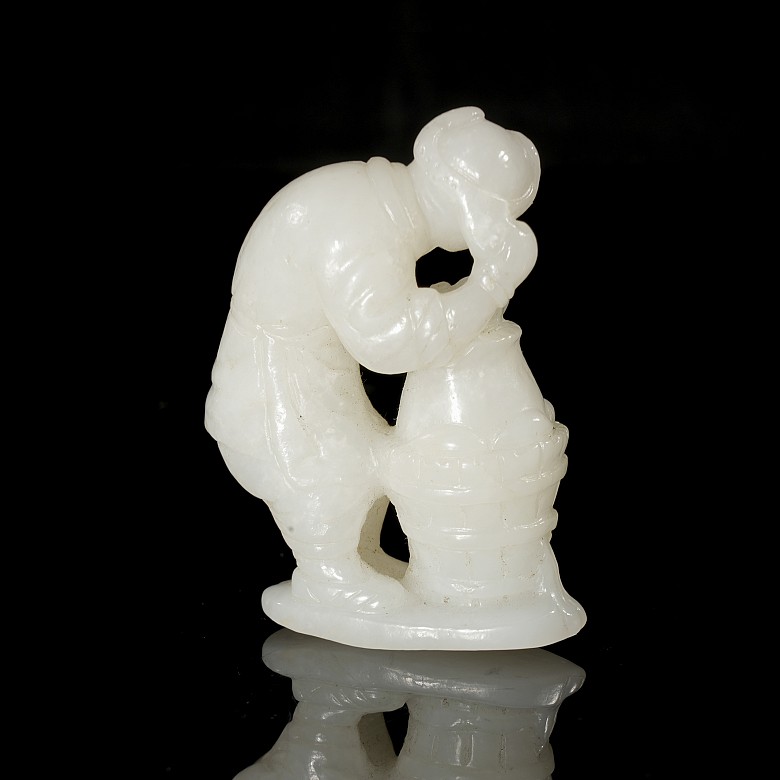 Carved jade figurine ‘Man with barrel’, Qing dynasty