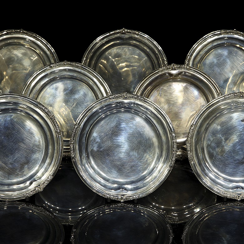 Colección de doce platos de postre de plata mexicana 