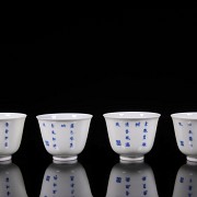 Set of twelve blue and white porcelain mugs, 20th century