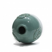 Porcelain bottle enameled in green, 20th century