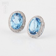 Topaz and diamond earrings in 18k white gold.