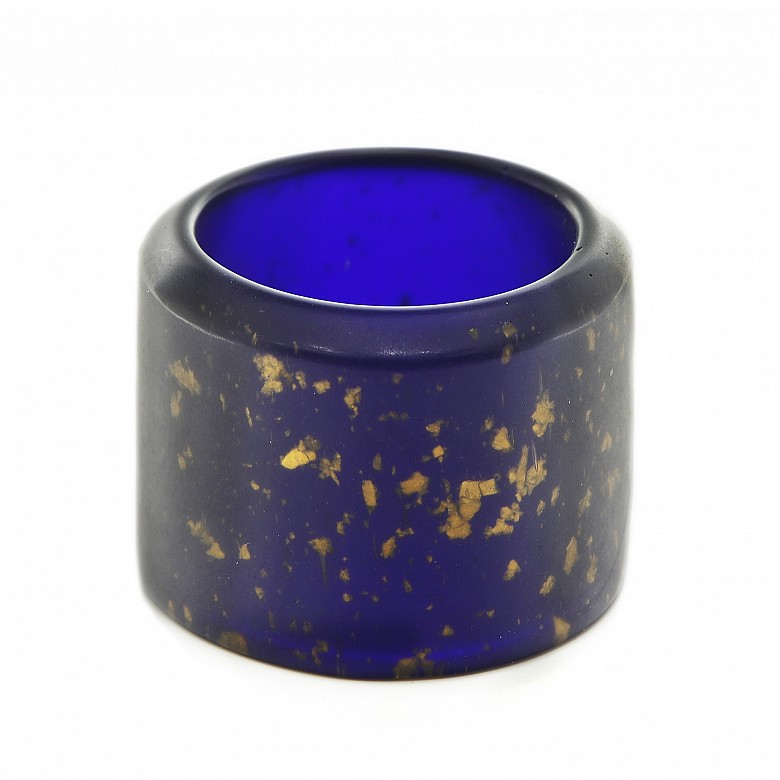 Archer's ring of blue glass and gold leaf shavings, 20th century