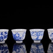 Set of twelve blue and white porcelain mugs, 20th century