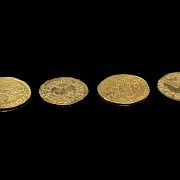 Group of four gold coins