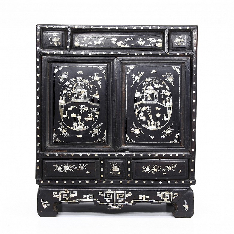 A Chinese lacquered cabinet with mother-of-pearl inlays, Qing dynasty.