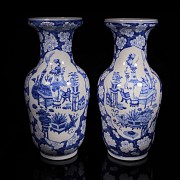 Pair of blue and white ‘Scenes and Plum Blossom’ vases, Qing Dynasty