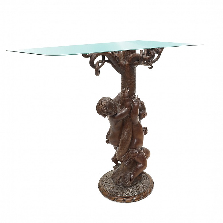 Vicente Andreu. Table console with carved wooden base and glass top, 20th century.