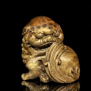 Chinese carved wooden lion, 20th century